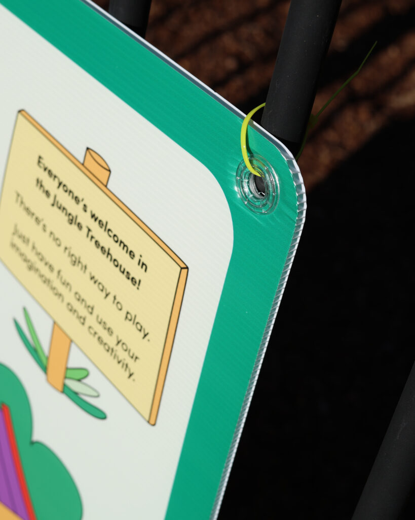 Corflute sign zip tied to fence